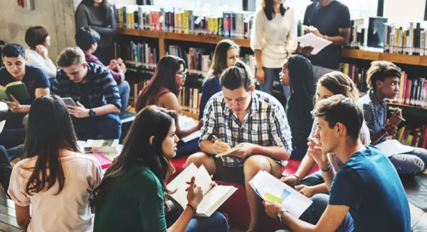 Student studying with Bible and notes