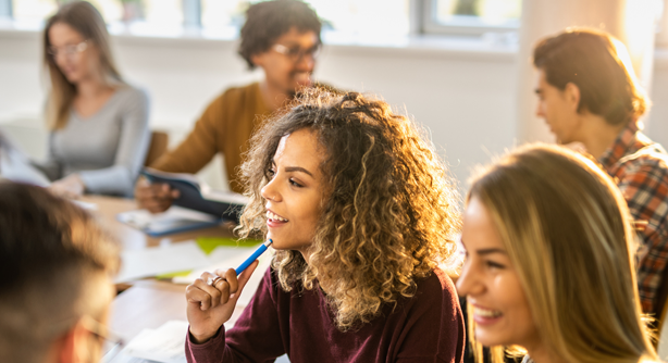 Students encouraging one another in prayer